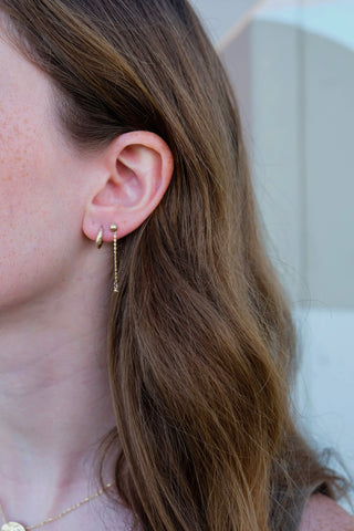 earring chains. gold earrings. ear chain. earring accessories.