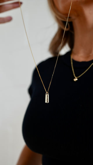 name tag necklace. custom necklace. name tags. gold necklace. fine jewelry. customization. 