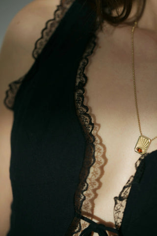 Warm citrine sunrise pendant on a 14k gold ball chain, worn layered