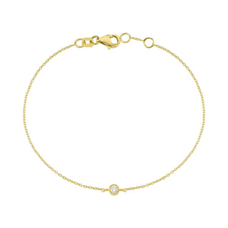 Gold bracelet with diamond bezel charm