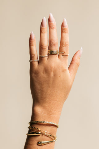 Ring Stacking photo. All rings are solid 14k gold with diamonds. Bracelet stack lovers