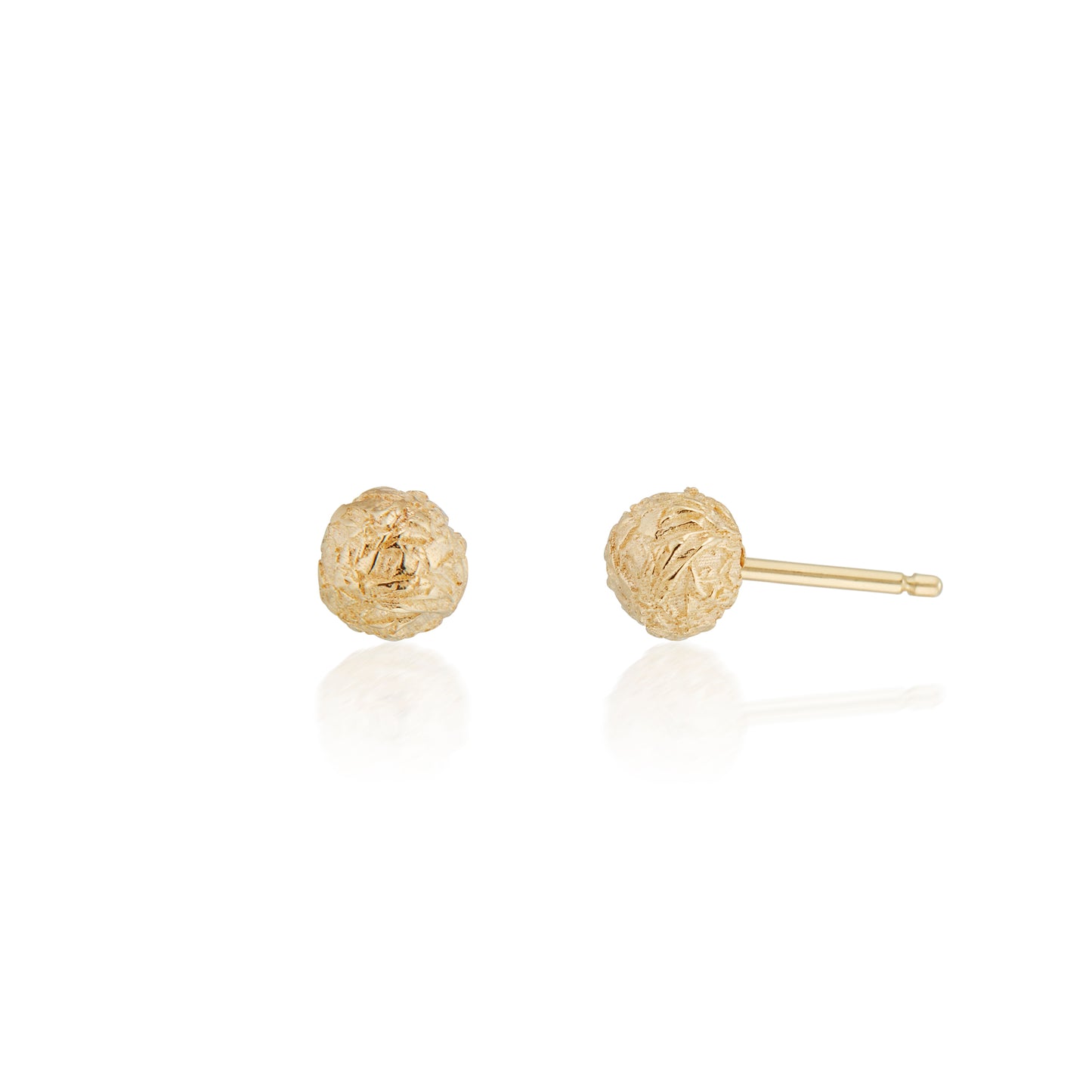 Gold earrings. gold stud earrings. sphere studs. studs. gold jewelry. foiled finish