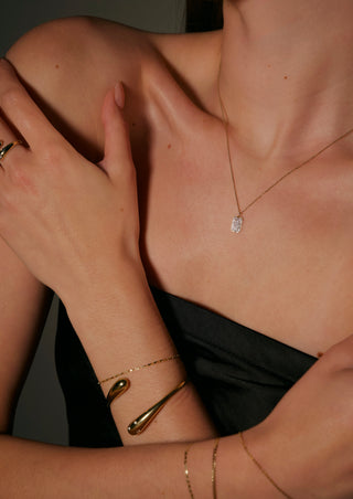 Close up of a pavé diamond dog tag necklace. Solid 14k Diamond Necklace