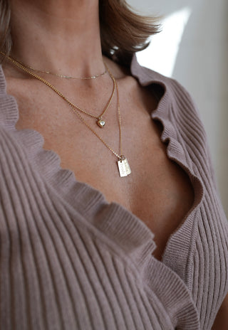 name tag necklace. custom necklace. name tags. gold necklace. fine jewelry. customization. 