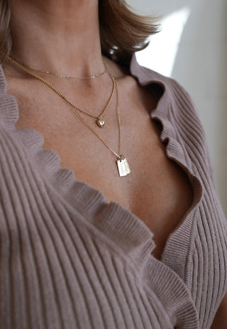 name tag necklace. custom necklace. name tags. gold necklace. fine jewelry. customization. 